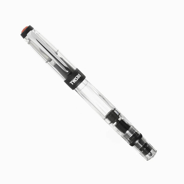 Twsbi Diamond 580AL R black fountain pen with gold accents and extra-fine nib, showcasing a sleek, elegant writing instrument.