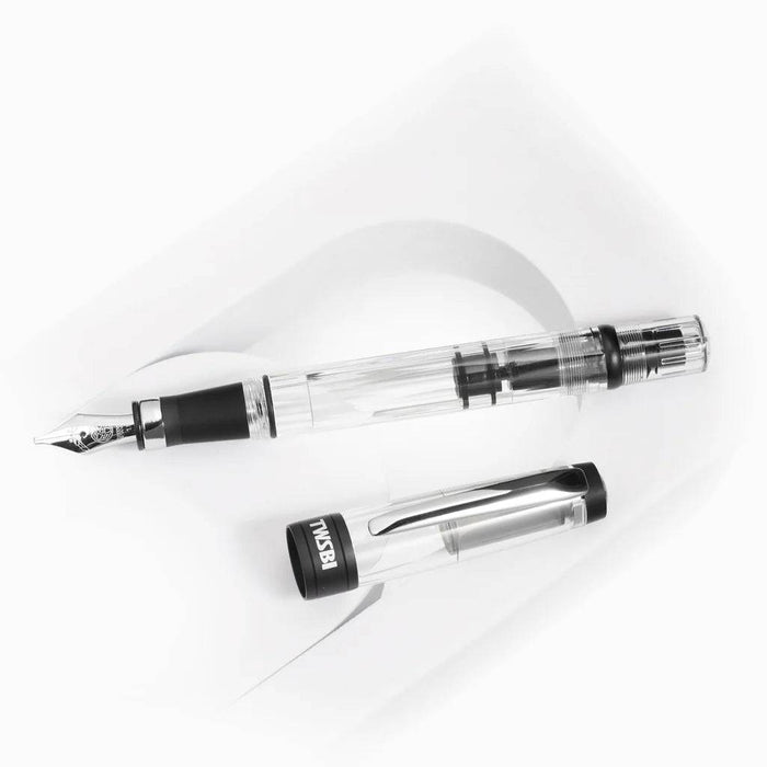 Twsbi Diamond 580AL R black fountain pen with silver accents and fine nib, showcasing sleek design and polished finish.