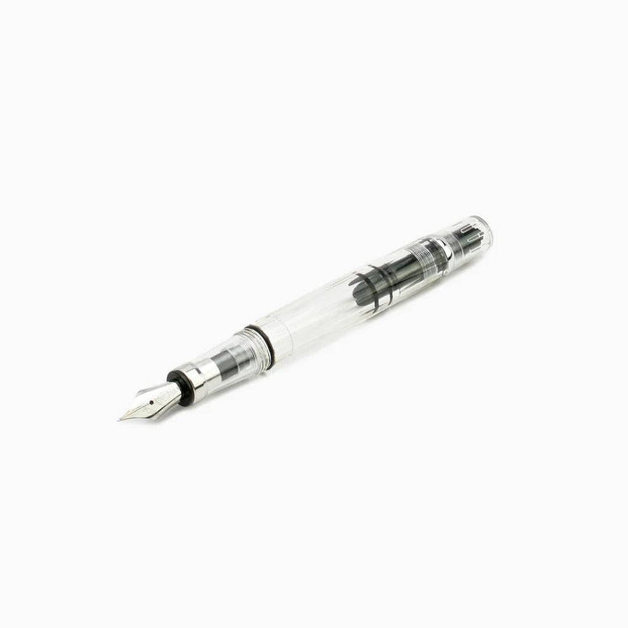 Twsbi Diamond 580 Clear fountain pen with transparent body and gold accents, featuring an extra-fine nib.