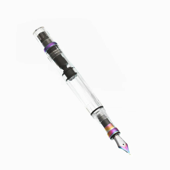 Twsbi Diamond 580 IRIS fountain pen with gold accents and translucent blue body, showcasing its elegant design and fine nib.