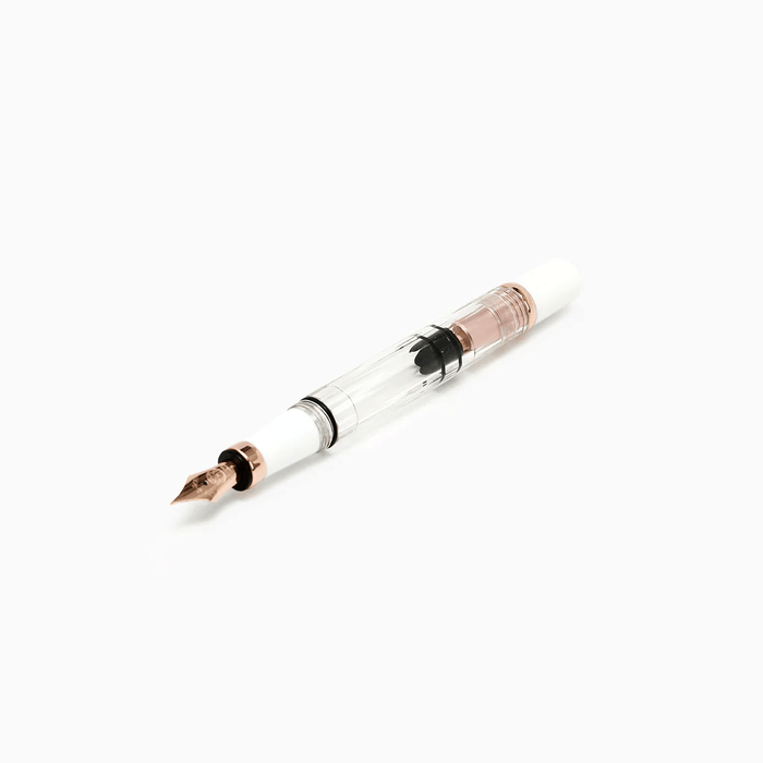 Twsbi Diamond 580 White Rose Gold II fountain pen with a sleek white body and rose gold accents, showing the pen's elegant design.