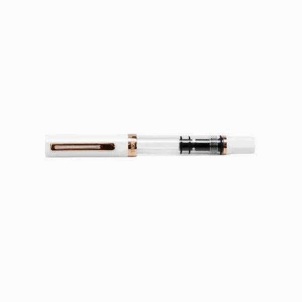 Twsbi Diamond 580 White Rose Gold II fountain pen with gold accents and detailed design, showcasing its elegant body and fine nib.
