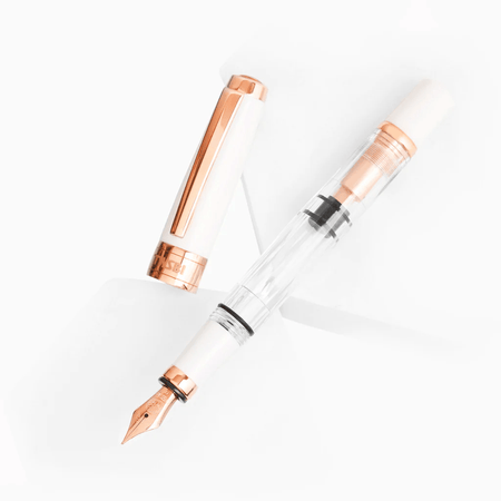 Twsbi Diamond 580 White Rose Gold II fountain pen with a sleek white and rose gold finish and fine nib.