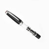 Twsbi Diamond Mini Classic fountain pen with an elegant black body and gold accents, showcasing its fine nib and sleek design.