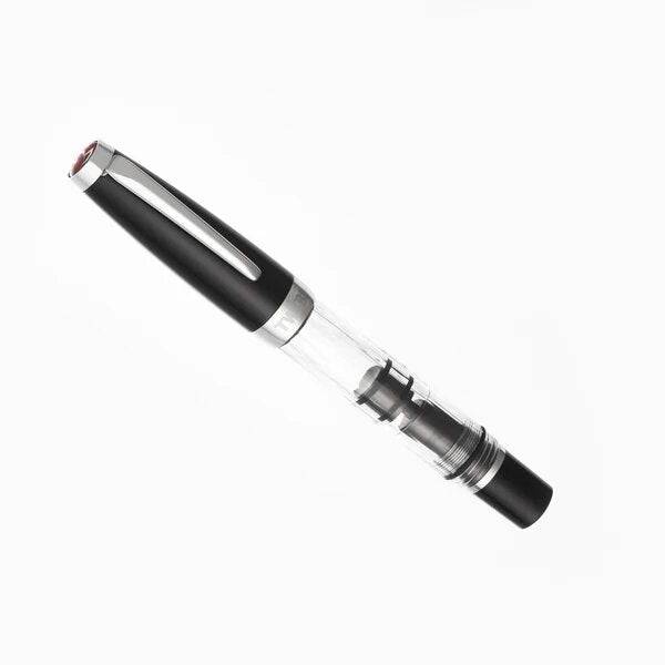 Twsbi Diamond Mini Classic fountain pen with an elegant black body and gold accents, showcasing its fine nib and sleek design.