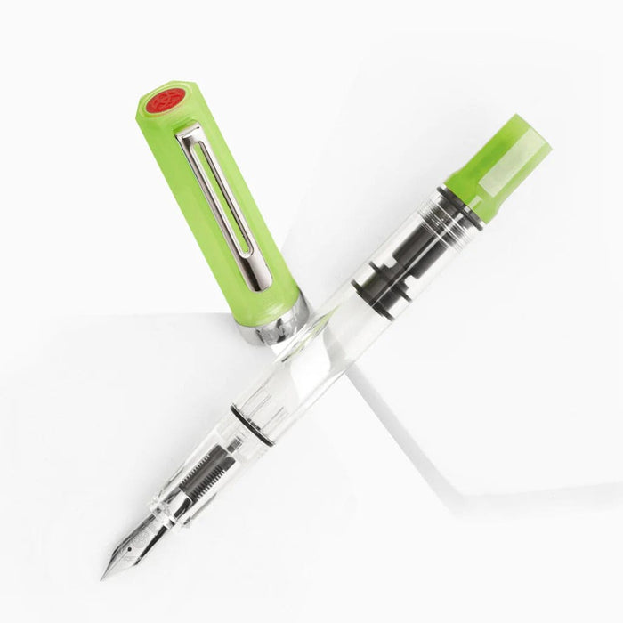 Twsbi Eco Glow Green fountain pen with translucent green barrel and silver accents, featuring an extra-fine nib.