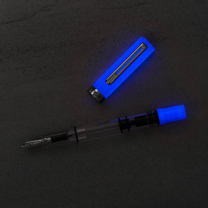 Twsbi Eco Glow Purple fountain pen with an elegant purple body and fine nib, designed for smooth writing and stylish appeal.