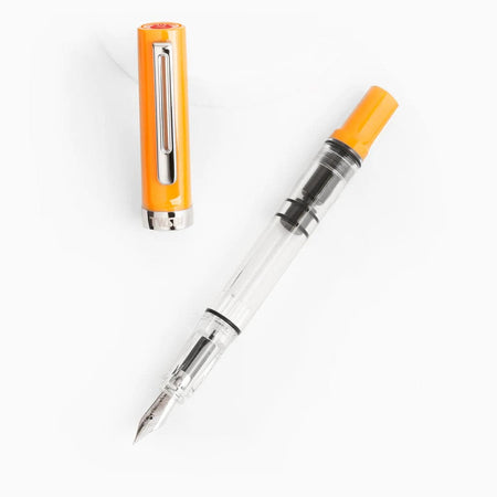 Twsbi Eco-T Saffron fountain pen with an extra-fine nib, featuring a vibrant saffron-colored body and sleek design.