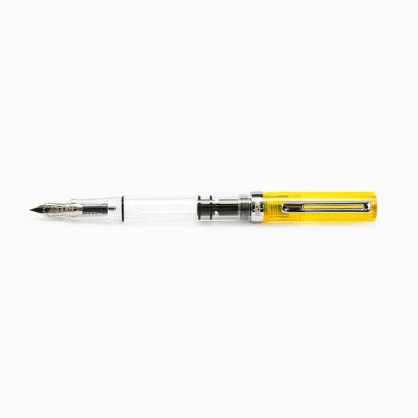 Twsbi Eco transparent yellow fountain pen with an extra-fine nib, showcasing its vibrant yellow barrel and sleek design.