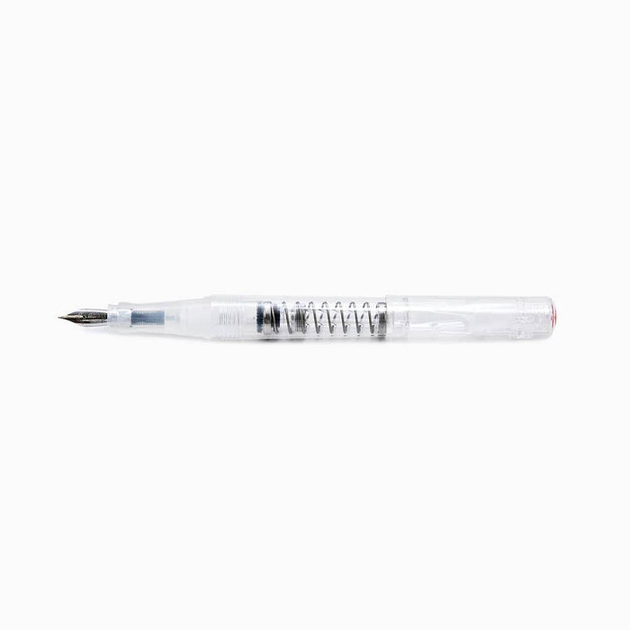 Twsbi Go Clear fountain pen with transparent body and fine nib, showcasing its sleek design and ink reservoir.