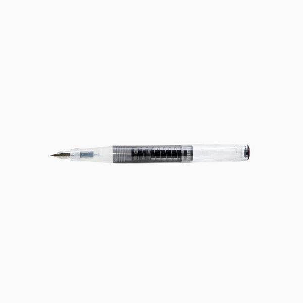 Twsbi Go Smoke fountain pen with transparent smoky barrel and fine nib, showcasing its sleek design and elegant craftsmanship.