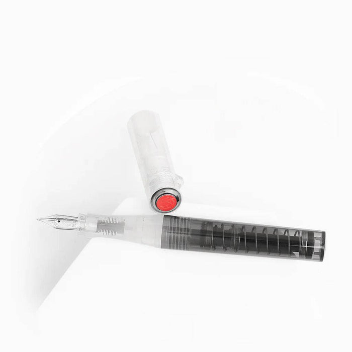 Twsbi Go Smoke fountain pen with extra-fine nib, black and gray smoky translucent plastic body, and metal clip.