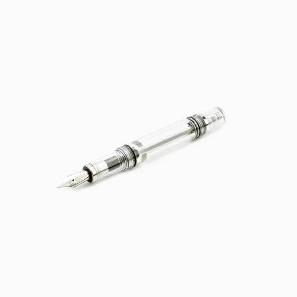 Twsbi Vac Mini Clear fountain pen with extra-fine nib, transparent body showing internal components, designed for smooth writing.