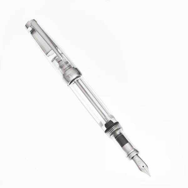 Twsbi Vac Mini Clear fountain pen with fine nib, transparent body showing internal components, designed for smooth writing.
