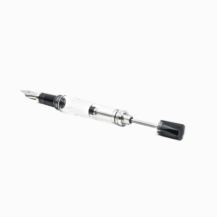 Twsbi VAC700R fountain pen with extra-fine nib, black body and silver accents, showcasing sleek design and writing tip.