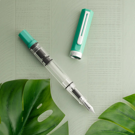 Twsbi Eco Persian Green fountain pen with smooth green barrel and silver accents, showcasing elegant design and craftsmanship.