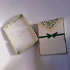 Green Florentine notecards from Rossi stationary set with decorative floral patterns and elegant design.