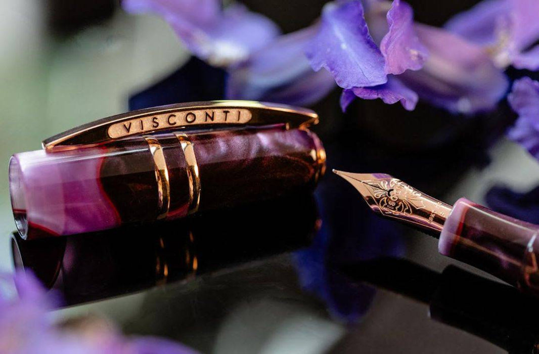 Visconti Homo Sapiens Iris Garden fountain pen with a sleek design and fine nib, showcasing intricate details and craftsmanship.