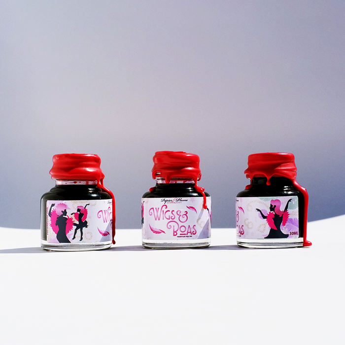 Papier Plume New Orleans Collection fountain pen ink bottle with colorful design and ink inside, suitable for writing and calligraphy.