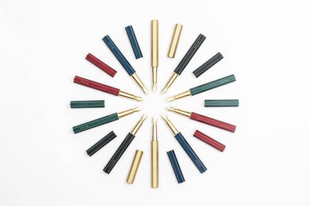 Black Y Studio Revolve fountain pen with fine nib, showcasing its sleek design and elegant craftsmanship.