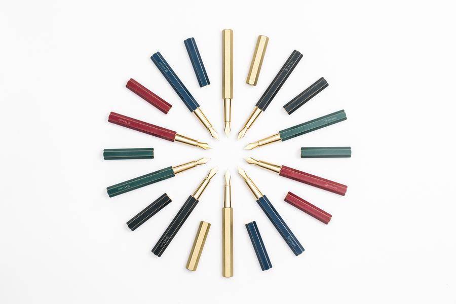 Black Y Studio Revolve fountain pen with fine nib, showcasing its sleek design and elegant craftsmanship.