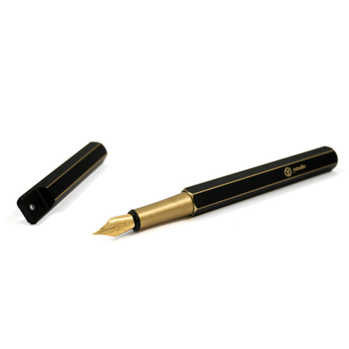 Y Studio Brassing portable fountain pen with fine nib, featuring a sleek design and metallic finish.