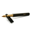 Y Studio Brassing portable fountain pen with fine nib, sleek design and metallic finish, perfect for writing on the go.