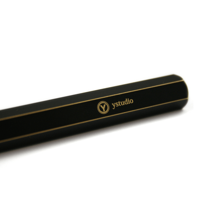 Y Studio Brassing portable fountain pen with fine nib, sleek design, and metallic finish for writing and collection.