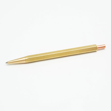 Y Studio Classic Revolve Mechanical Pencil Lite in brass, featuring a sleek design and smooth writing tip.