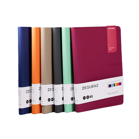 A Zequenz Color Journals A5 dotted journal with colorful cover and dotted pages, perfect for writing and note-taking.