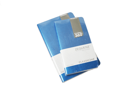 Zequenz Classic 360 Galaxy lined journal with silver cover, featuring a slim design and smooth pages for writing and note-taking.